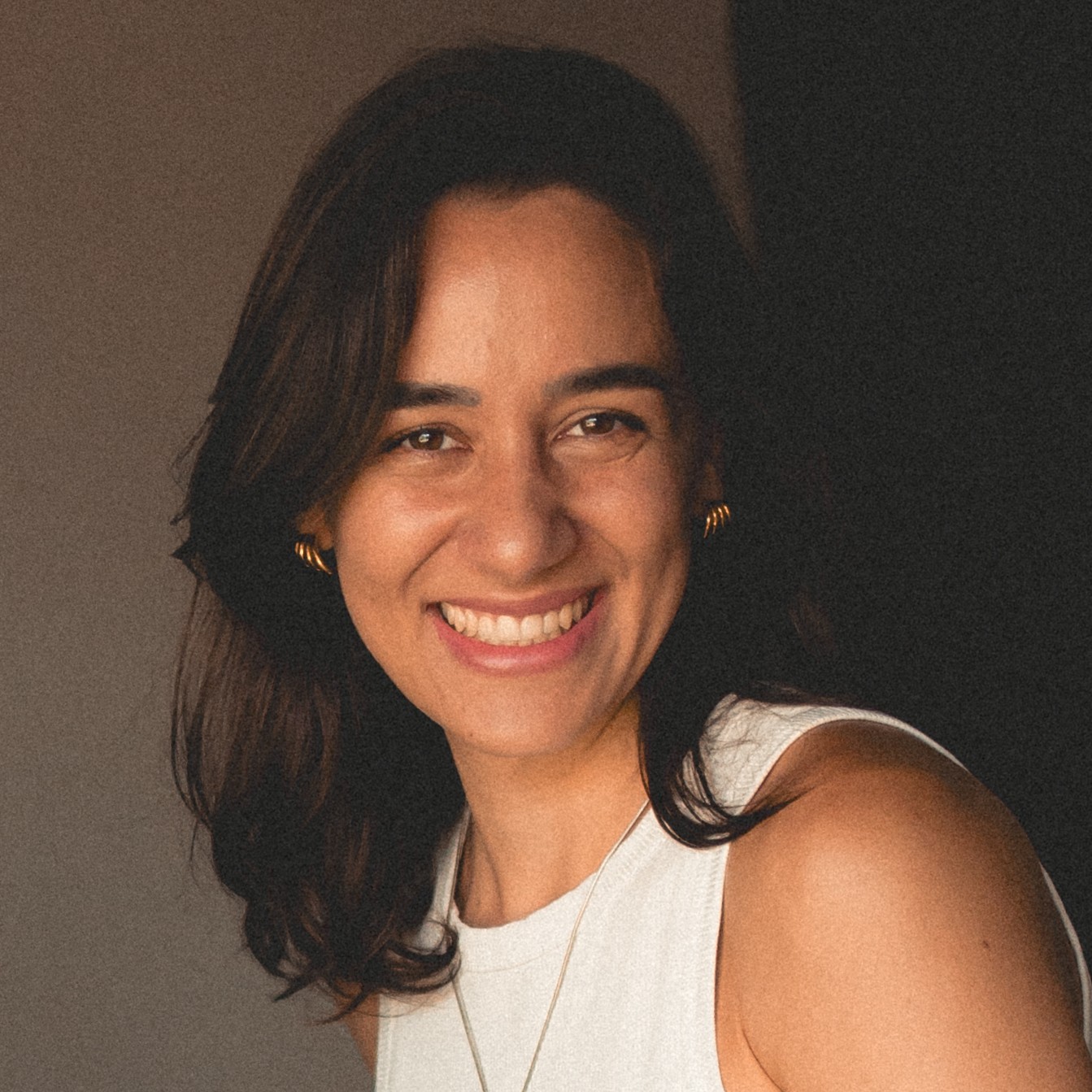 Foto de Ingrid, instrutora do curso Brownies de Ouro